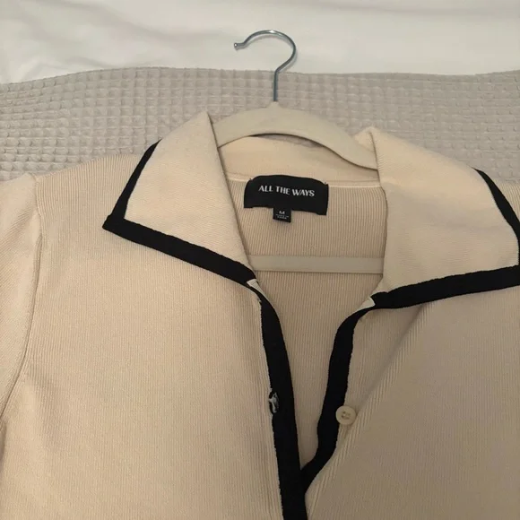 Chic Cream Top and Mini Skirt with Black Accents - Picture 10 of 10